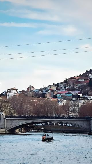 1-day private charter tour in Tbilisi - Holy Trinity, Dry Bridge, Puppet Clock Tower, sulfur baths & old town