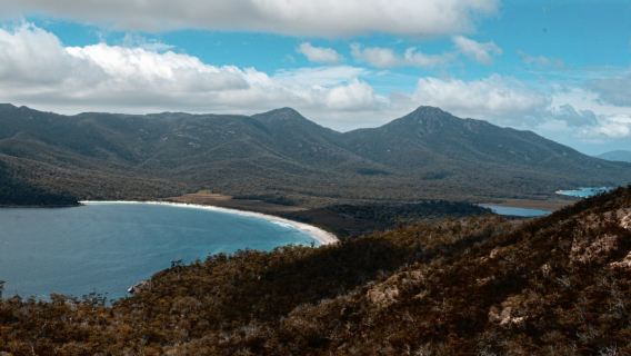 Must-buy items for Singles' Day: Storewide discounts and a 1-day tour to Wineglass Bay, Tasmania with multiple itineraries available.