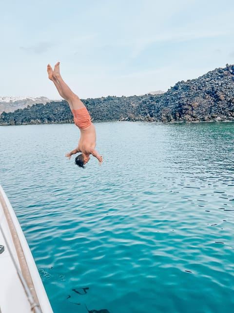 Santorini: Platinum Catamaran Cruise w/ BBQ Meal & Open Bar