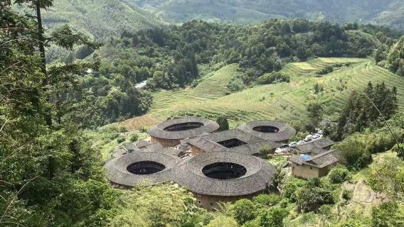 Nanjing Tianluokeng Tulou + Yuchang Building + Taxia Village 1-day tour with free transfers + multilingual guide