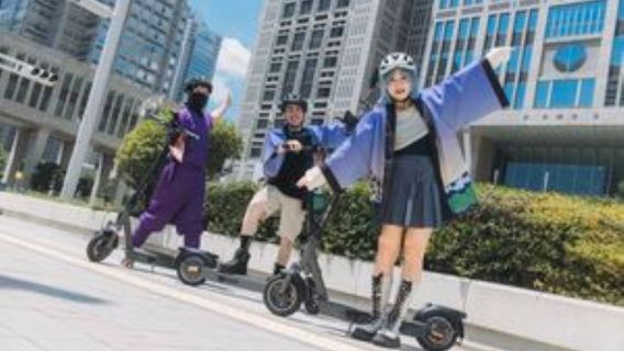Visite de Tokyo en planche à roulettes électrique ninja (inclut un billet d'entrée pour le spectacle et un service de photographie)