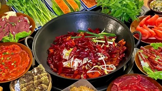 Chongqing Wartime Cave Hotpot (Liziba Light Rail Building Penetration Branch) [Retro atmosphere immersive experience + photo spot with light rail passing through building + secret recipe broth aroma filling the seats + freshly sliced premium meat]