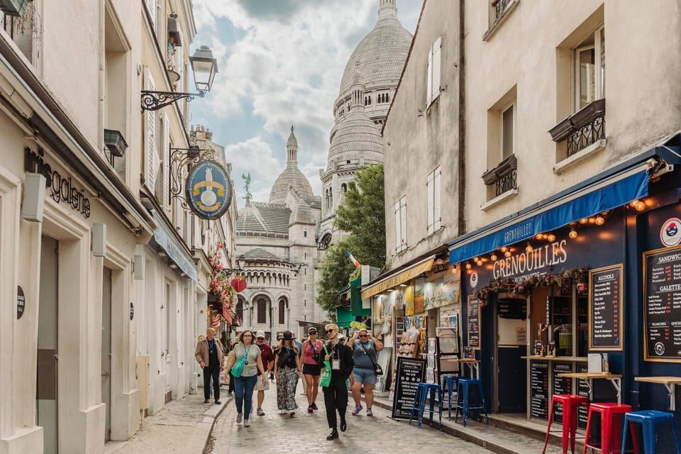 Paris: Full Day Tour with Louvre, Eiffel Tower & Notre Dame