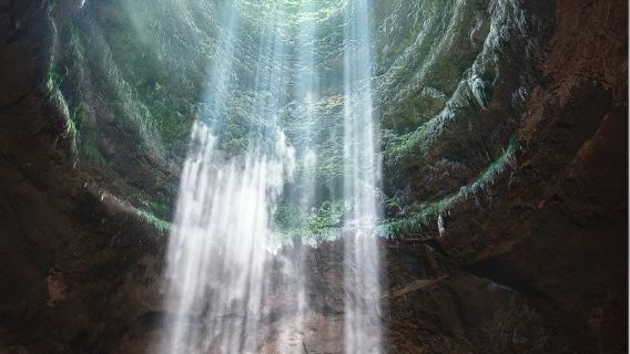 Pindul Cave and Jomblang Cave 1-day tour with river tubing experience