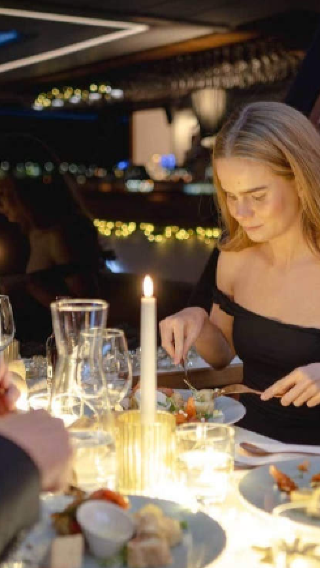 Northern lights dinner cruise in Tromso with arctic seafood three-course dinner & polar museum