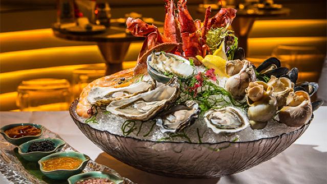 Макао: купон на роскошное морепродуктовое ассорти в ресторане SKY 21