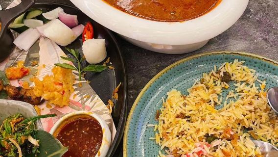 Услуга бронирования столика в популярном ресторане De.Wan1958 в Куала-Лумпуре