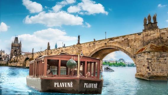 Charles Bridge river boat cruise with walking guided tour