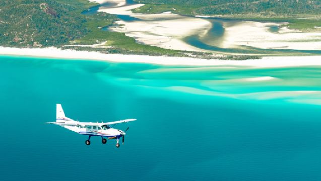 1hr Whitsundays Scenic Flight [View Heart Reef/Whitehaven Beach + Optional Speedboating + Round-trip from Airlie Beach/Hamilton + Optional Hotel Transfers]