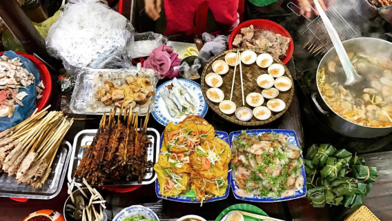 Hue Food Tour by Cyclo: Local Specialties & Perfume River Folk Music