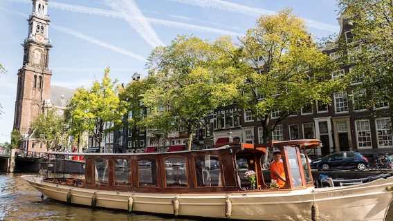 Crociera di lusso ad Amsterdam: partenza dalla stazione centrale [include vino e formaggio illimitato/ guida visita guidata/viaggio confortevole in tutte le condizioni atmosferiche]