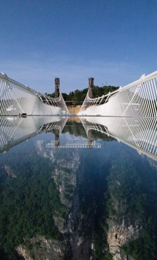 Thrilling challenge: Zhangjiajie grand canyon + glass bridge 1-day tour, exciting canyon amusement park