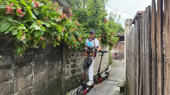 Bangkok: Guided E-Scooter Tour to Temples and Riverside