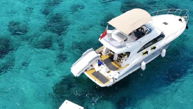 Wanning Shimei Körfezi Jiajing Adası VIP küçük grup deniz turu + mercan resiflerinde şnorkelle dalış + jet ski + muz botu + deniz kaydırağı + popüler sihirli halı + cam bot havadan çekim + profesyonel eğitmen