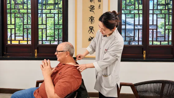 Xi'an Terracotta Warriors Day Trip + Optional Experiences: Chinese Massage/Flower-Shaped Steamed Buns and Noodle Making/Chinese Tea Drinking