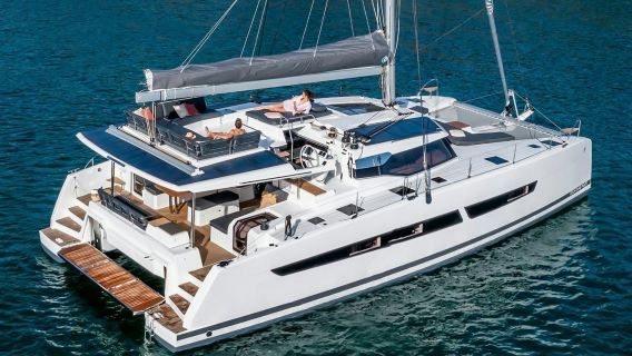 Mykonos: Crucero en catamarán + Comida, bebidas y transporte