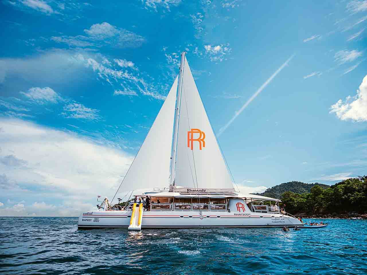 Phuket Racha Island + Coral Island Day Trip: Sailing and snorkeling, with optional scuba diving. Transfers included.