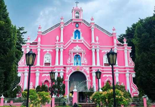 From Manila: Buffalo City Day Tour - Churches, Carabao Rides, Waterfall Restaurant & Bamboo Rafting