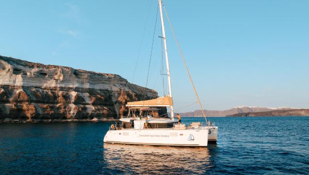 Luxury Santorini Sunset Cruise with swim stops, dinner, BBQ, drinks and transfers