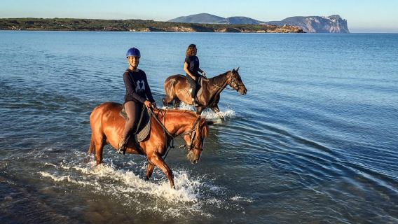 Horseback riding tour on Porto Ferro beach in Alghero