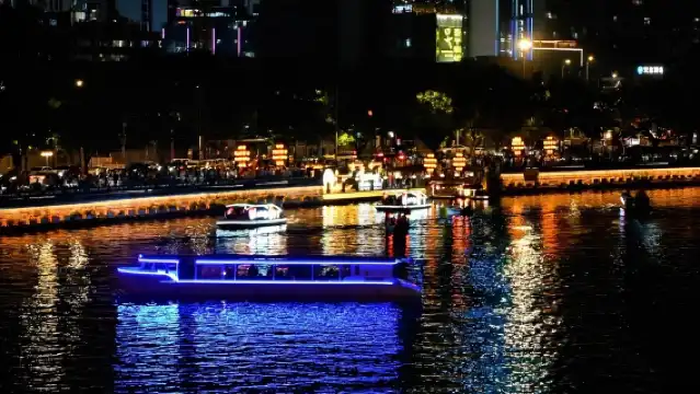 Chengdu Jinjiang Cruise: A must-visit night attraction, showcasing the city's iconic skyline by boat