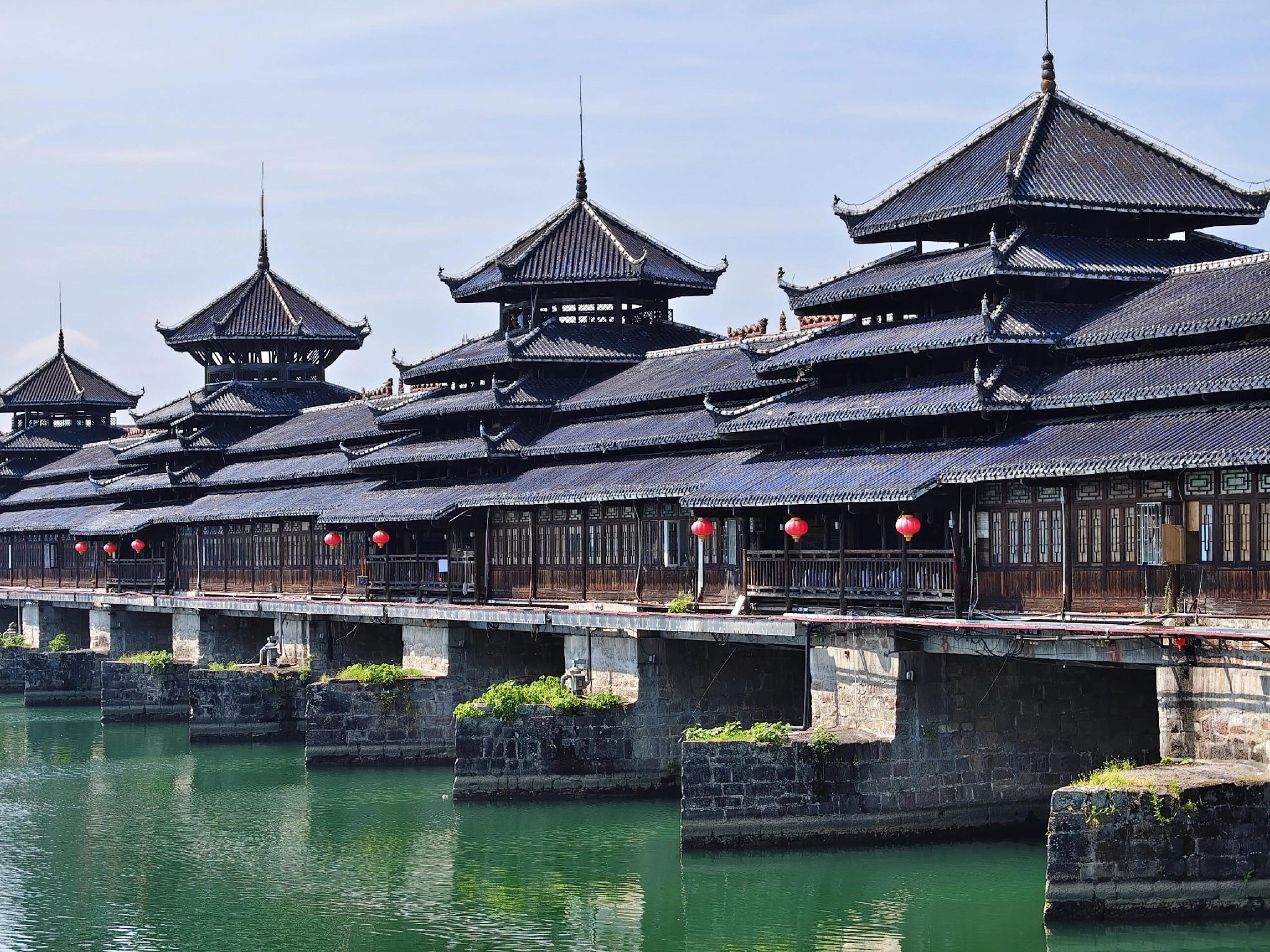 1-day tour of Wanfo Mountain + Lusheng Drum Tower + Yutou Dong Village private charter in Huaihua, Hunan with English service available