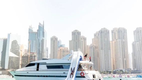 Yacht sailing with waterslides and BBQ from Dubai Harbour