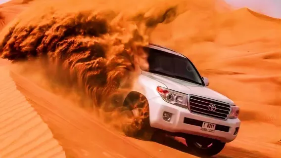 Tour di un giorno nell'accampamento nel deserto di Dubai [Popolare safari nel deserto, passeggiata in cammello, spettacoli tradizionali e trasferimento dall'hotel]