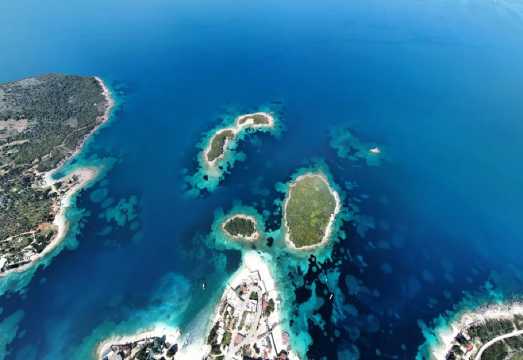 Sunset Sailing to Ksamil Islands with Fruits and Drinks: Albania Boat Tour Guide