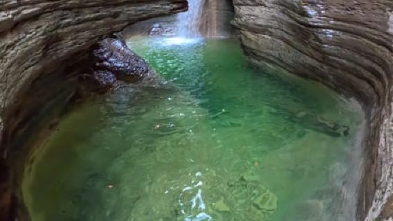 Dolomites near the Cortina Olympics site: canyoning at the Cornolade waterfall