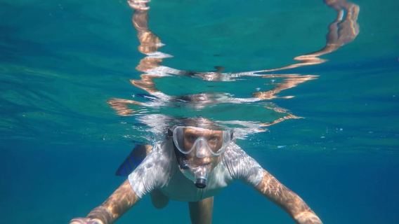 Snorkeling di taman Riviera di Ulisse