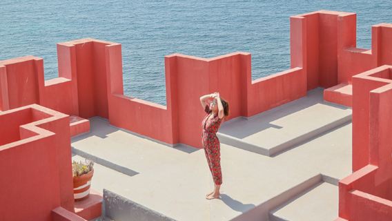 Travel photography at the Red Walls in Calpe, Spain[Spanish Red Walls travel photographer wedding photography travel portraits vacation photo shoots]