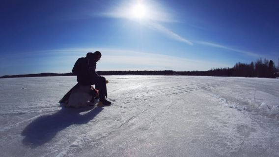 Snowshoe Trip for Ice Fishing in Saariselka