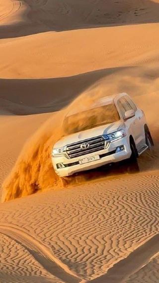 VIP Desert Safari Dubai, Camel Riding, Quad Biking, Sandboarding & BBQ Buffet Dinner