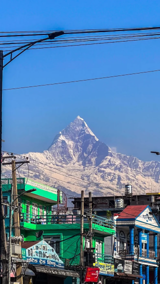 Pokhara Peace Temple + Devi's Fall Pokhara + Phewa Lake + Old Town 1-day Tour [Optional Guide]
