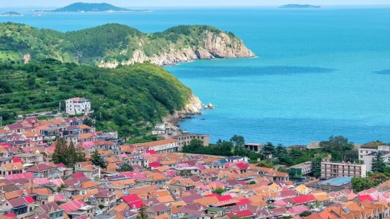Tour de un día a la zona de interés turístico de Laoshan [Opcional: , asiento de avión y ruta costera]