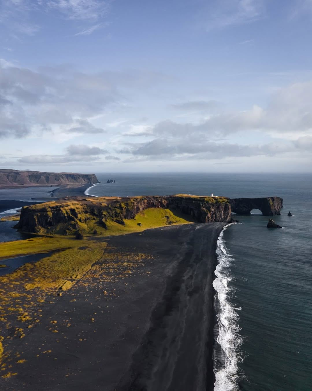 Local driver 1-day tour of Iceland's South Coast via private charter including Seljalandsfoss, Skogafoss, Vik Town black sand beach