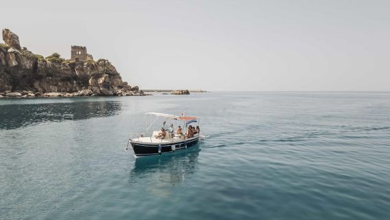 Day trips along the coast of Cefalù with swimming, snorkeling, and aperitif
