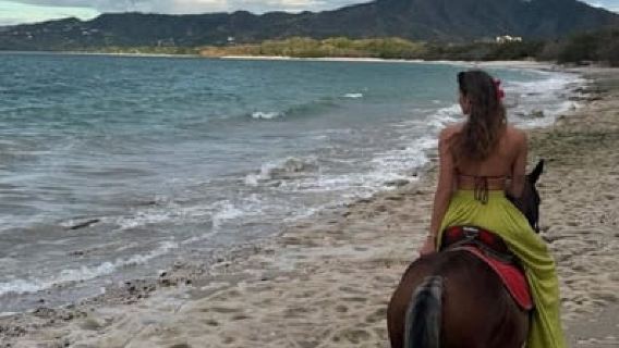 Playa Flamingo: ขี่ม้าบนชายหาด