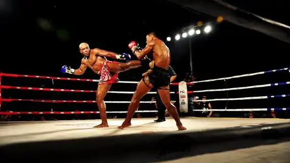 A Muay Thai, kick boxer waiting for his fight, Phuket , Thailand