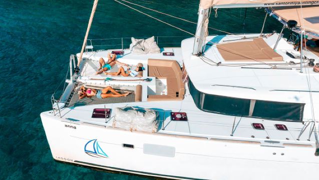 Santorini: Luxury Catamaran Cruise with swim stops,  lunch, BBQ,transfers and transfers