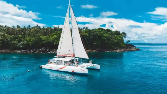Featured tour starting at 2288 THB: 1-hr diving and snorkeling experience at Coral Island and Ko Racha Yai from Phuket, Thailand on the Phuket Rainbow boat (snorkeling experience + twin-island exploration + sunset dolphin watching tour)