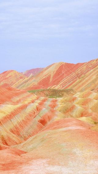 Zhangye Colorful Danxia Scenic Spot half-day tour (red, orange, yellow and green hues dye the peaks, colorful hills like waves)