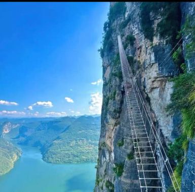 Via ferrata at Jigongling: challenge yourself with a heart-pounding cliffside adventure [walk among 