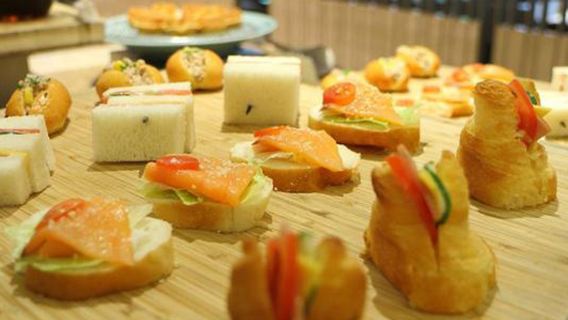 Bono para té buffet para 2 personas en el café Le Café, 2F del Hotel Royal Taipéi (fines de semana +NT$100 por 2 personas)