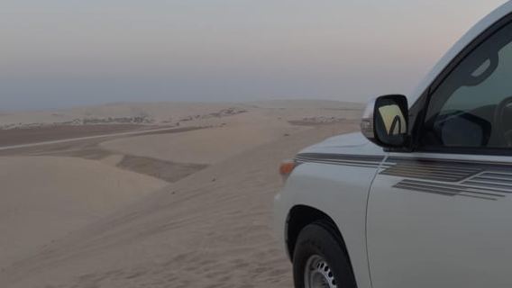 Doha : Safari au coucher du soleil dans le désert avec balade à dos de chameau et sandboard