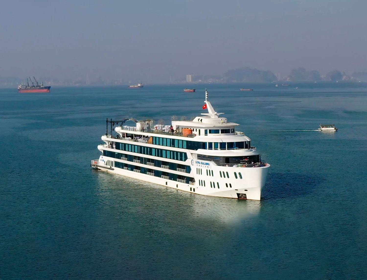 A day trip to Ha Long Bay, Vietnam, departing from Ha Long City/pier. [Operated by a local Vietnamese boat fleet]