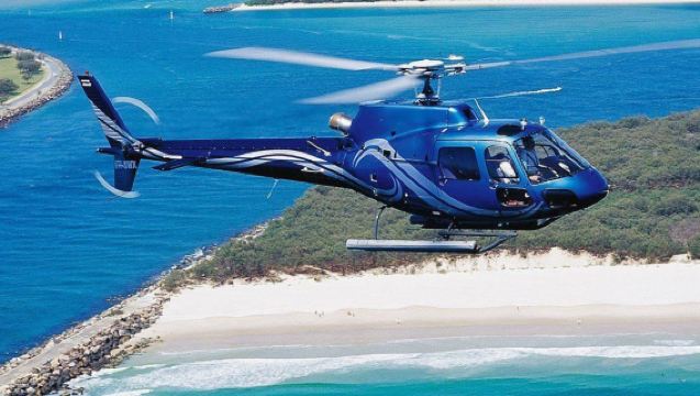 Helicopter sightseeing at Warner Bros. Movie World on the Gold Coast [5/10/15 min experience + multiple time slots available + scenic coastal/multi-attraction routes]