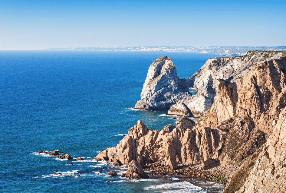 From Lisbon: Sintra, Pena Palace, Regaleira, Cabo da Roca, and Cascais