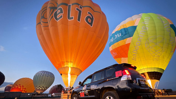 Sunrise hot air balloon ride over the palm grove in Marrakech